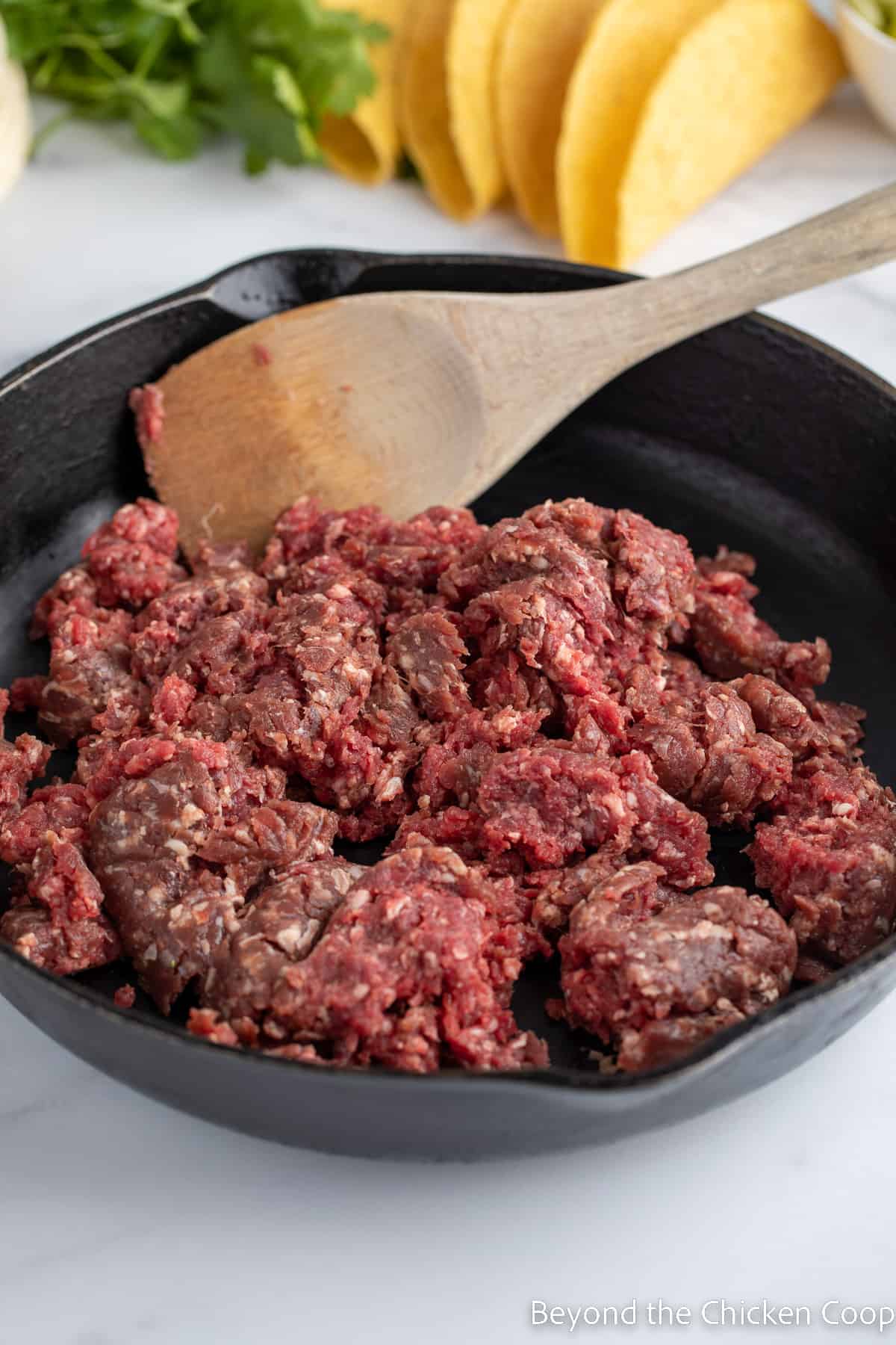 Ground venison in a cast iron skillet. 