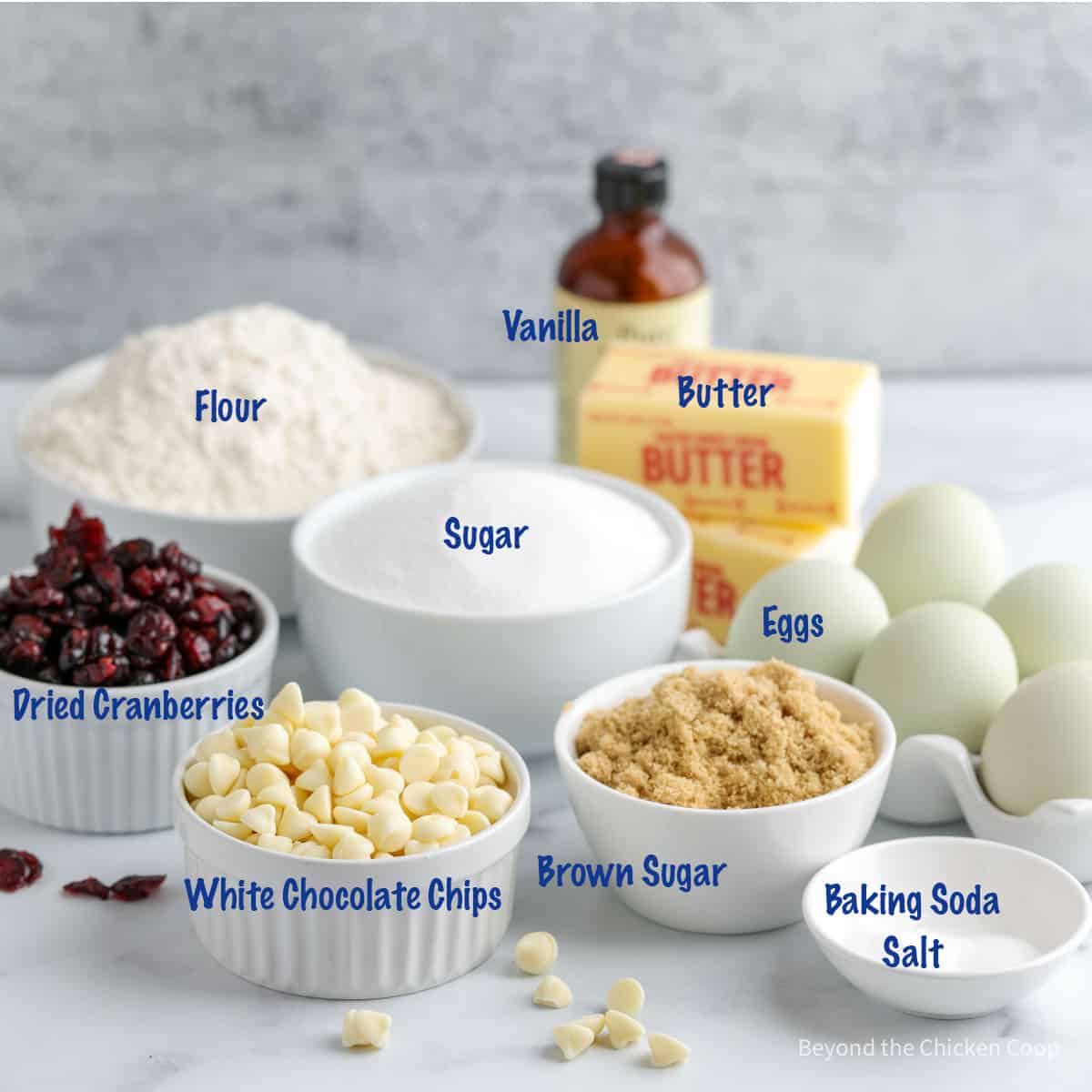 Ingredients for making cookies with white chocolate chips. 