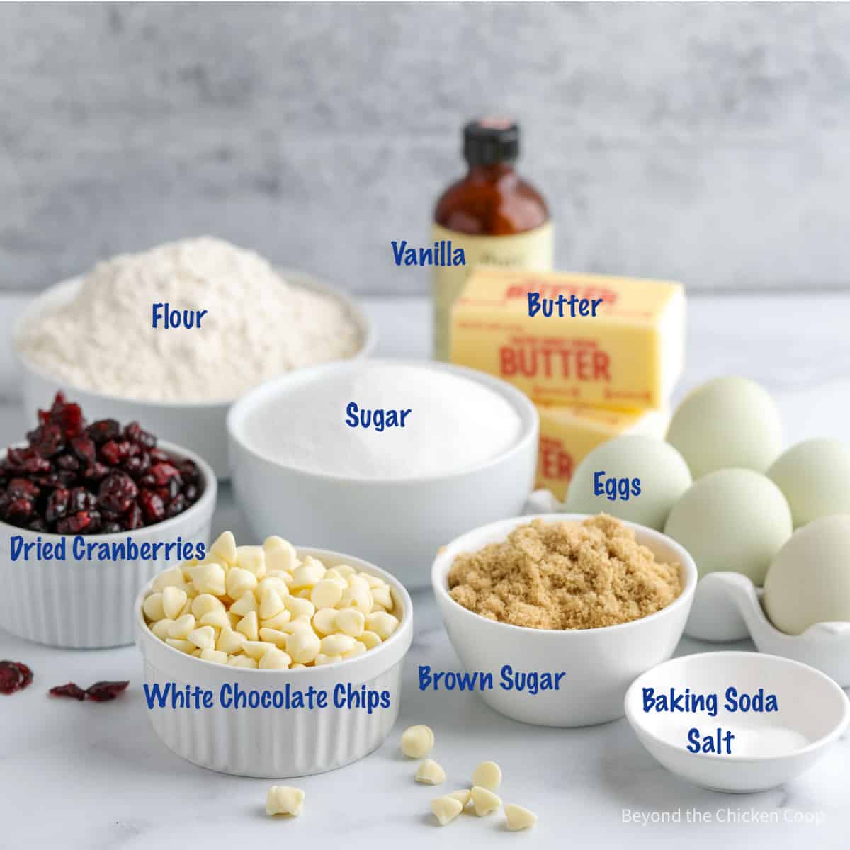 Ingredients for making cookies with white chocolate chips.