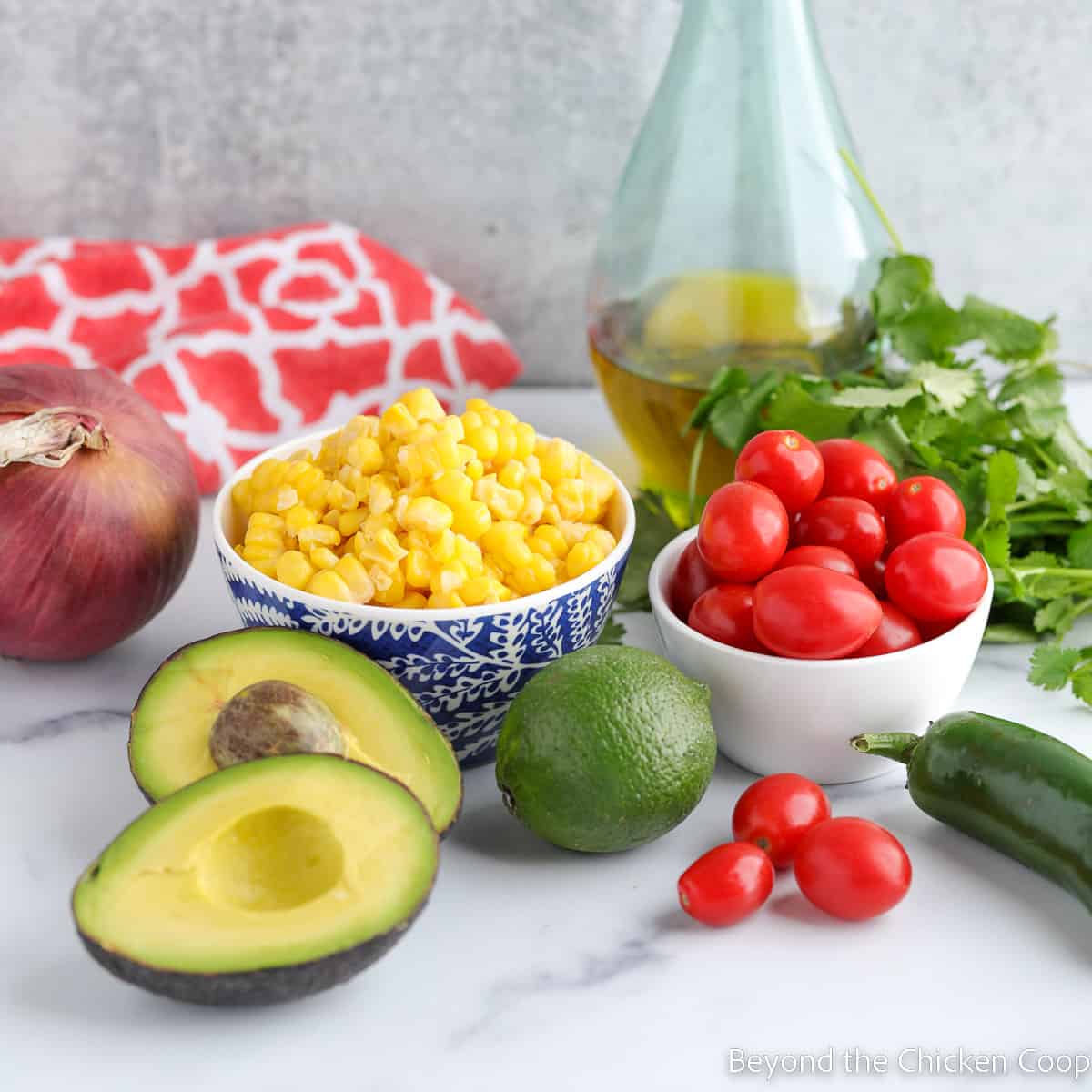 Ingredients for making a salad with corn and avocados. 