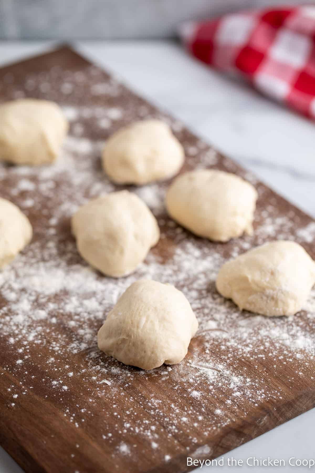 Bread dough divided into small balls. 