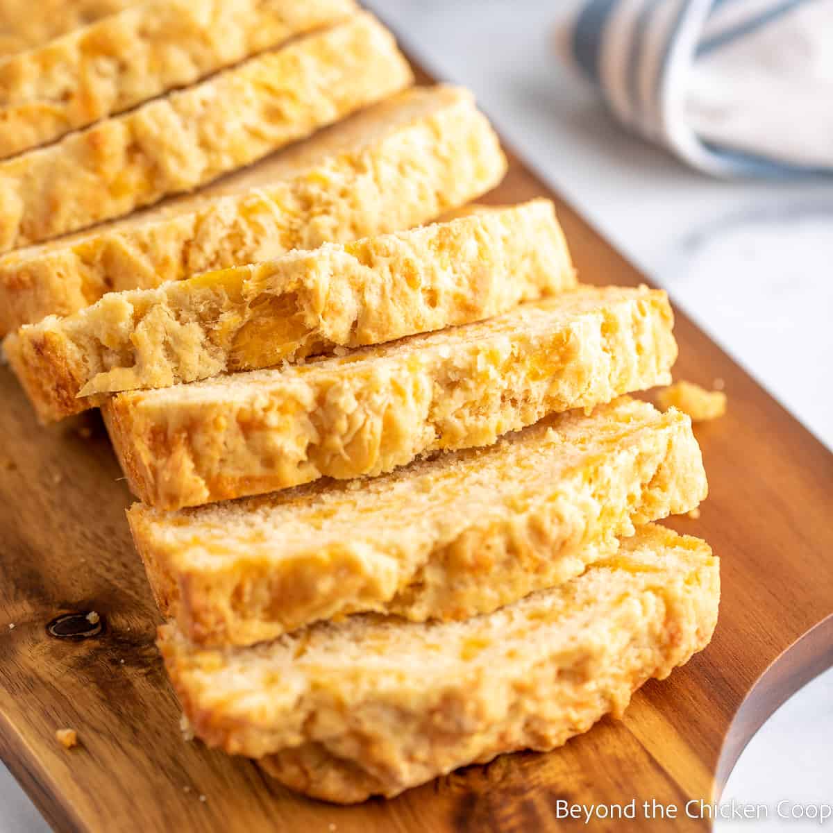 Sliced bread on a cutting board. 