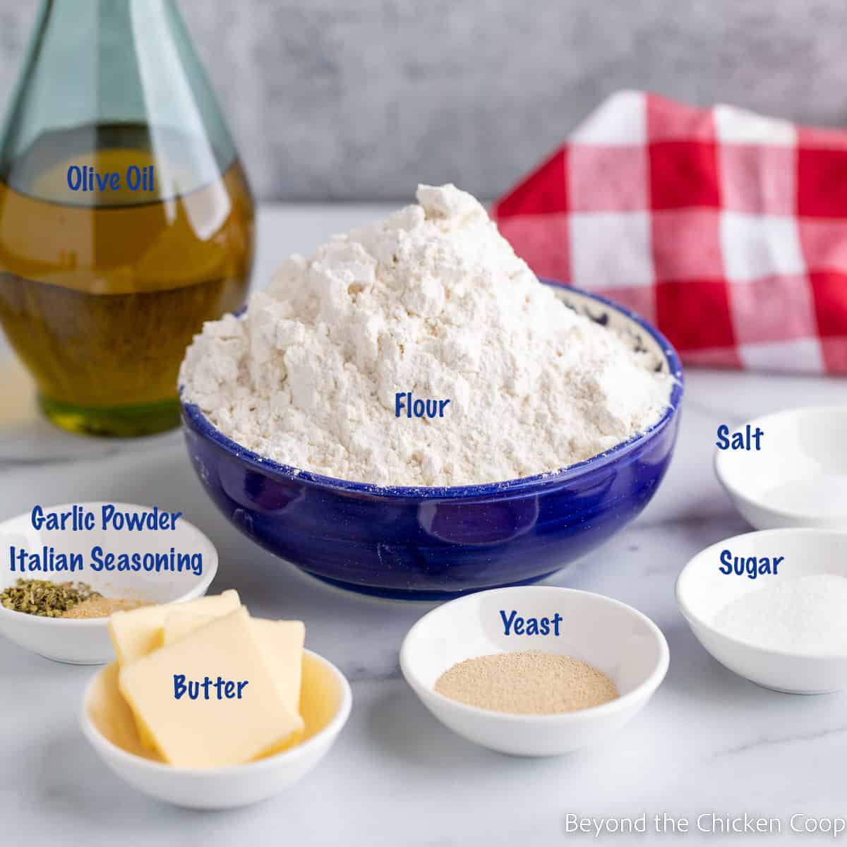 Bowls filled with flour and other ingredients. 