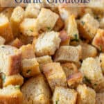 Croutons with parsley in a roasting pan.