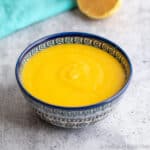 A bowl filled with lemon curd.