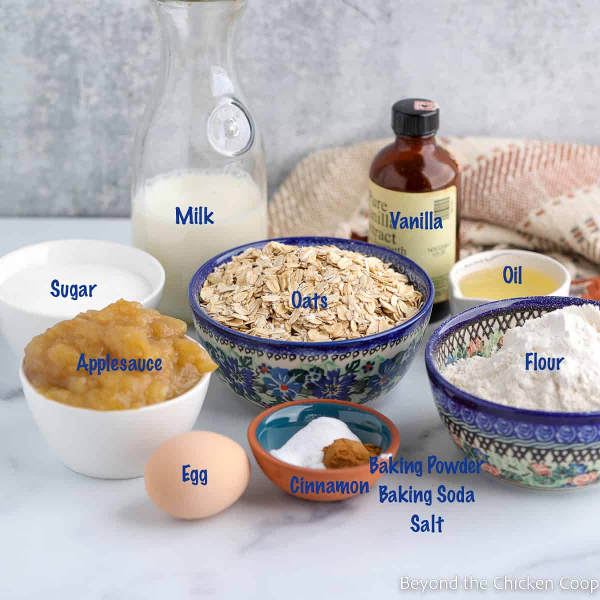 Small bowls with different ingredients for making muffins.  f