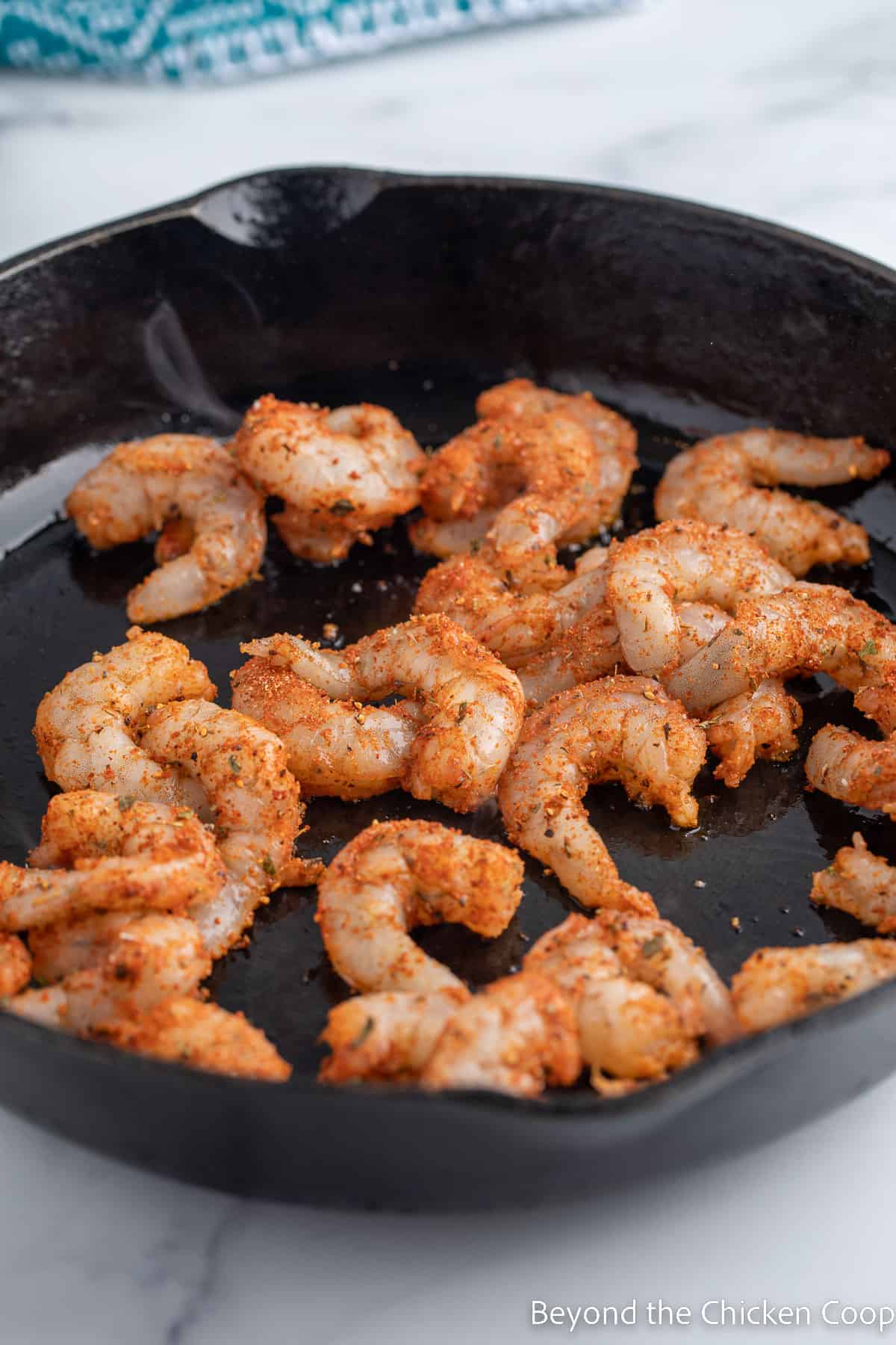 Shrimp in a cast iron skillet. 