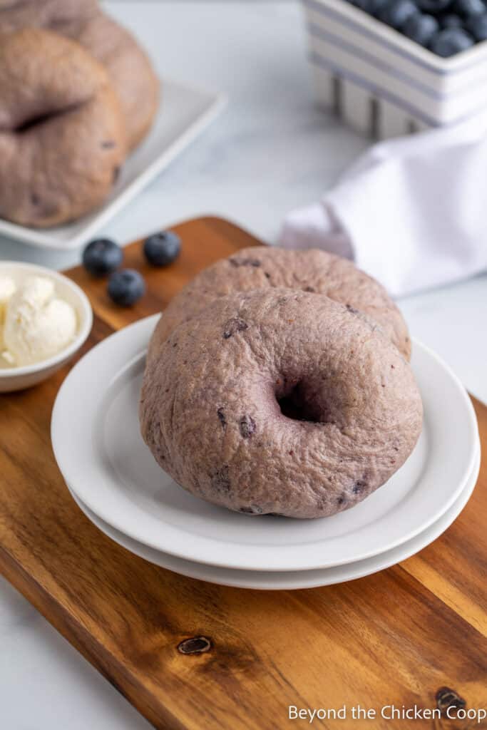 Bagels on a white plate.