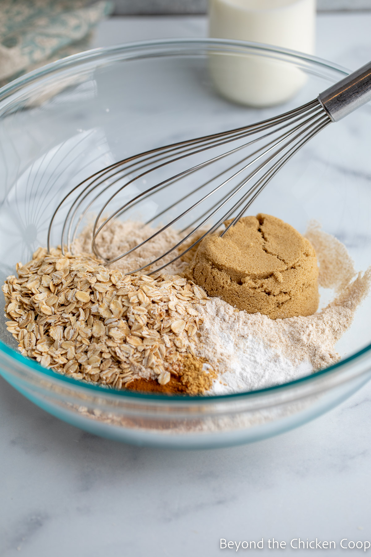 Flour, oats and brown sugar in a bowl. 