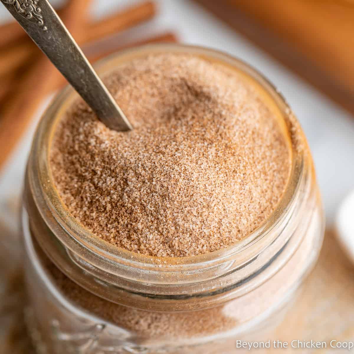 Cinnamon and sugar mixed together in a canning jar.