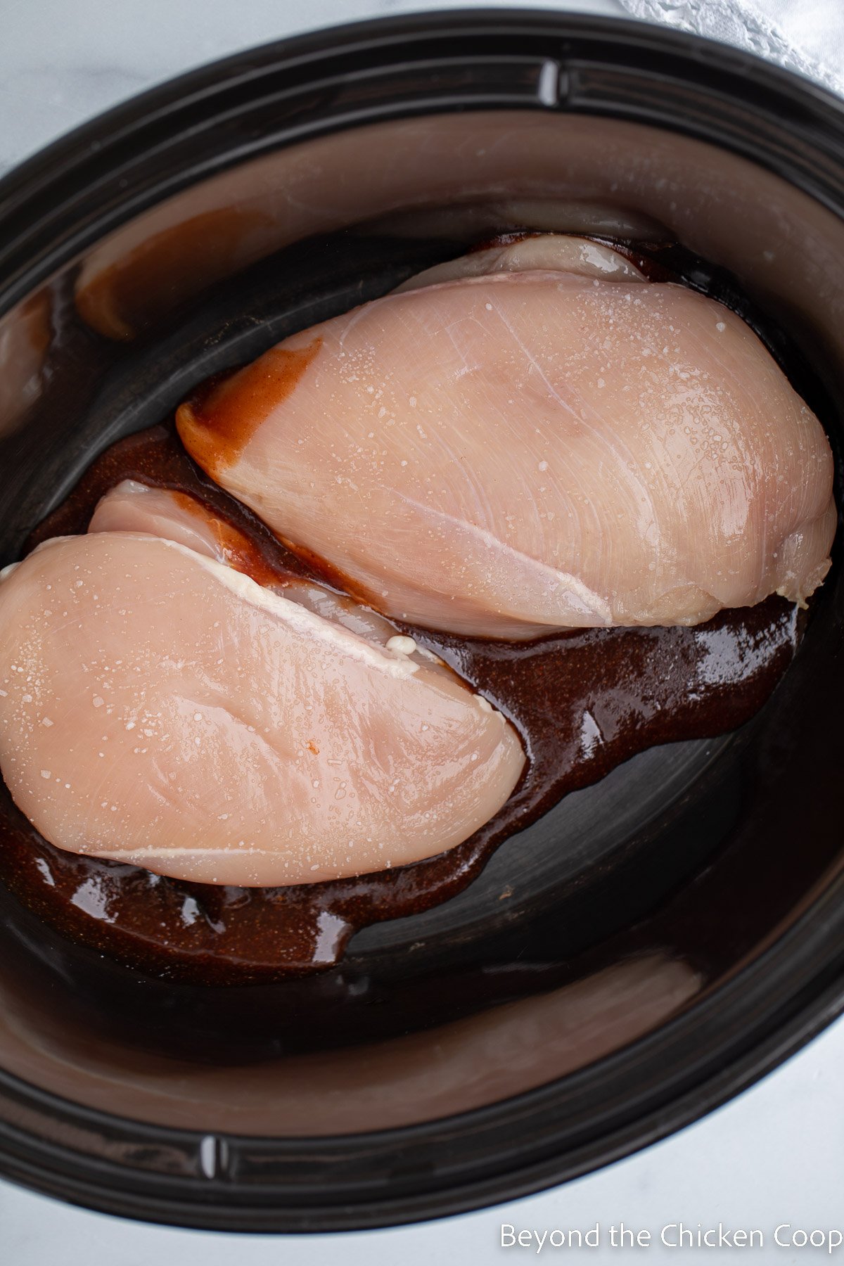 Chicken breasts in a crock pot. 