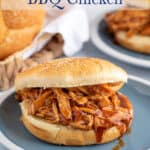 A chicken sandwich filled with shredded bbq chicken.