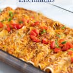 Enchiladas in a baking dish.