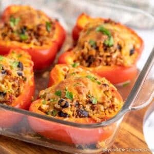 Stuffed peppers topped with cheese.