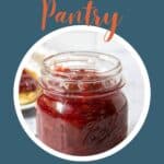 Rhubarb jam in a glass canning jar.