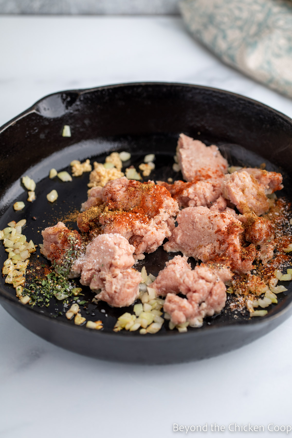 Ground turkey in a cast iron skillet. 