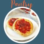 Strawberry jam on toasted english muffins.