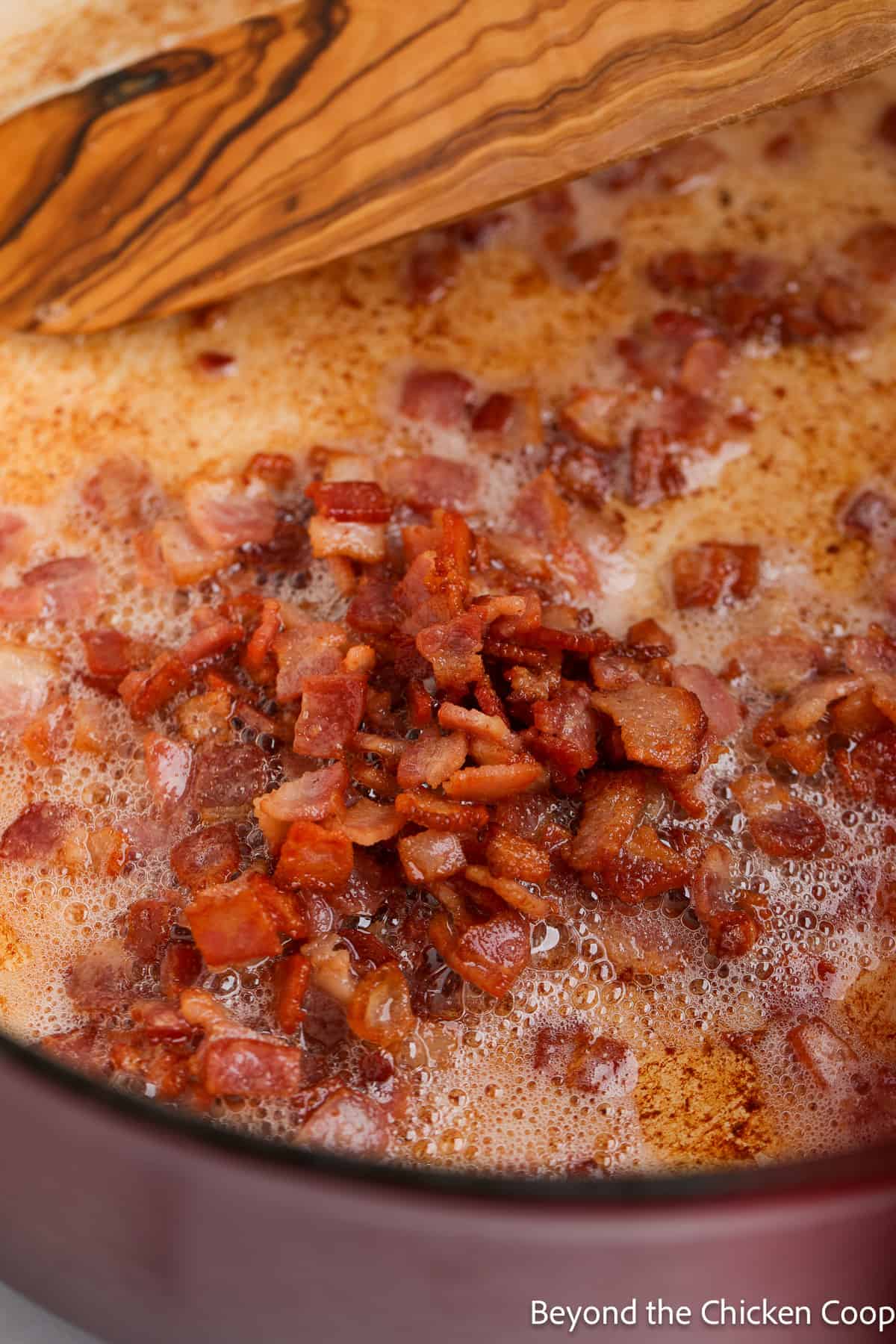 Cooking bacon in a pot. 