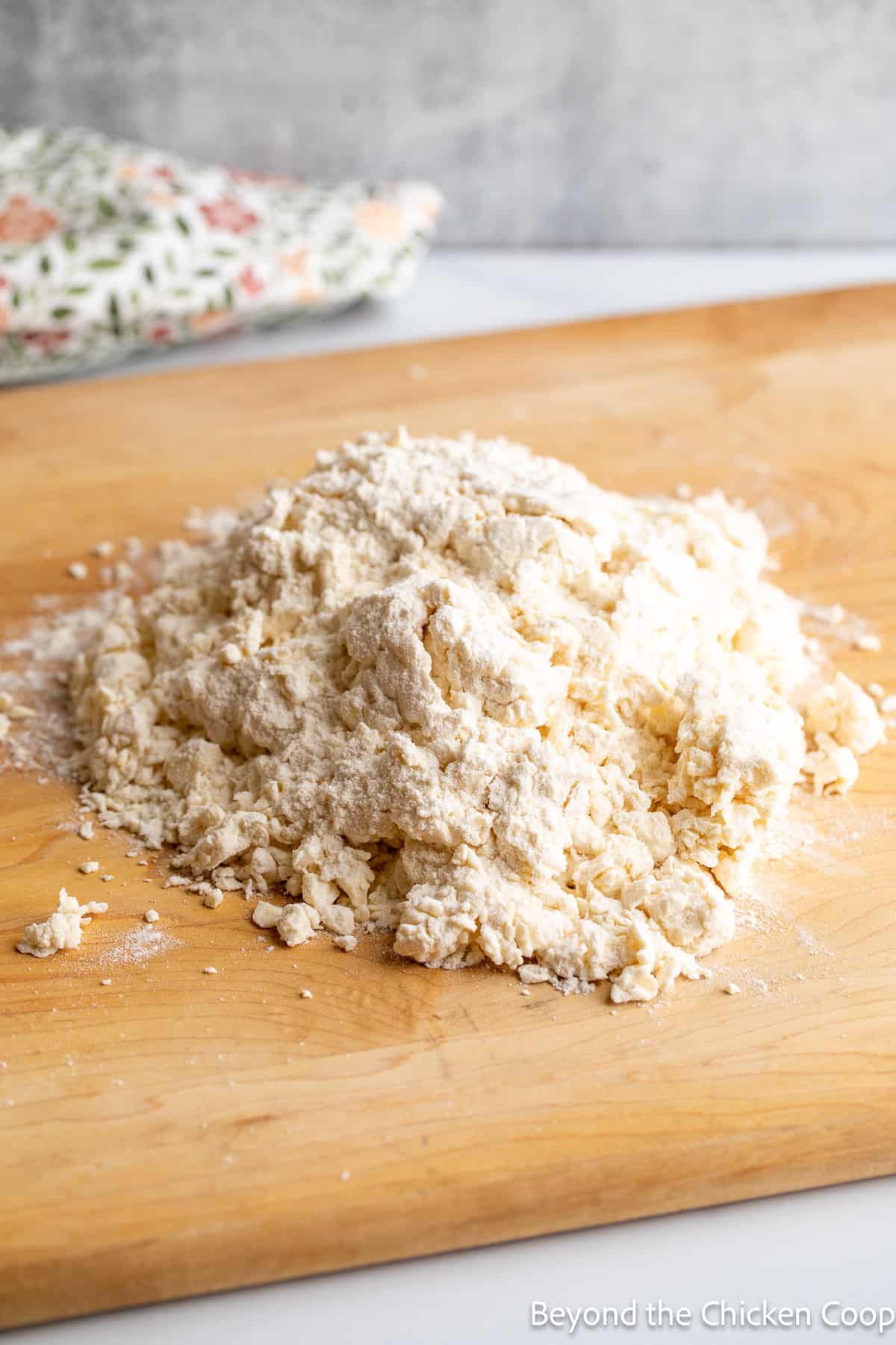 Biscuit dough on a wooden board. 