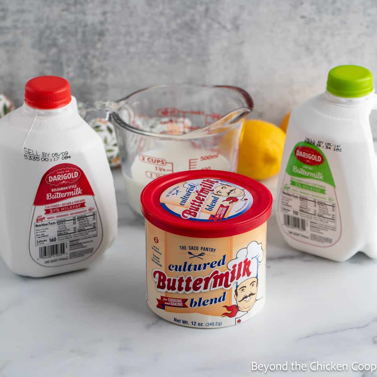 Four different types of buttermilk displayed together. 