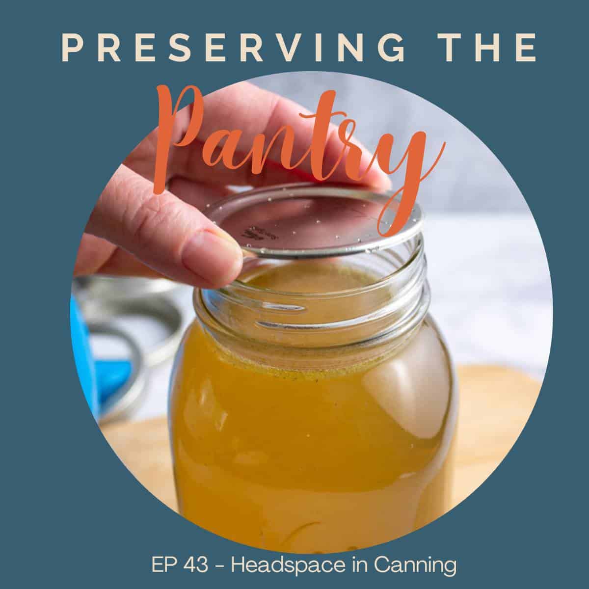 Placing a lid on a canning jar.