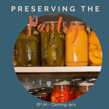 Canning jars filled with food on a shelf.