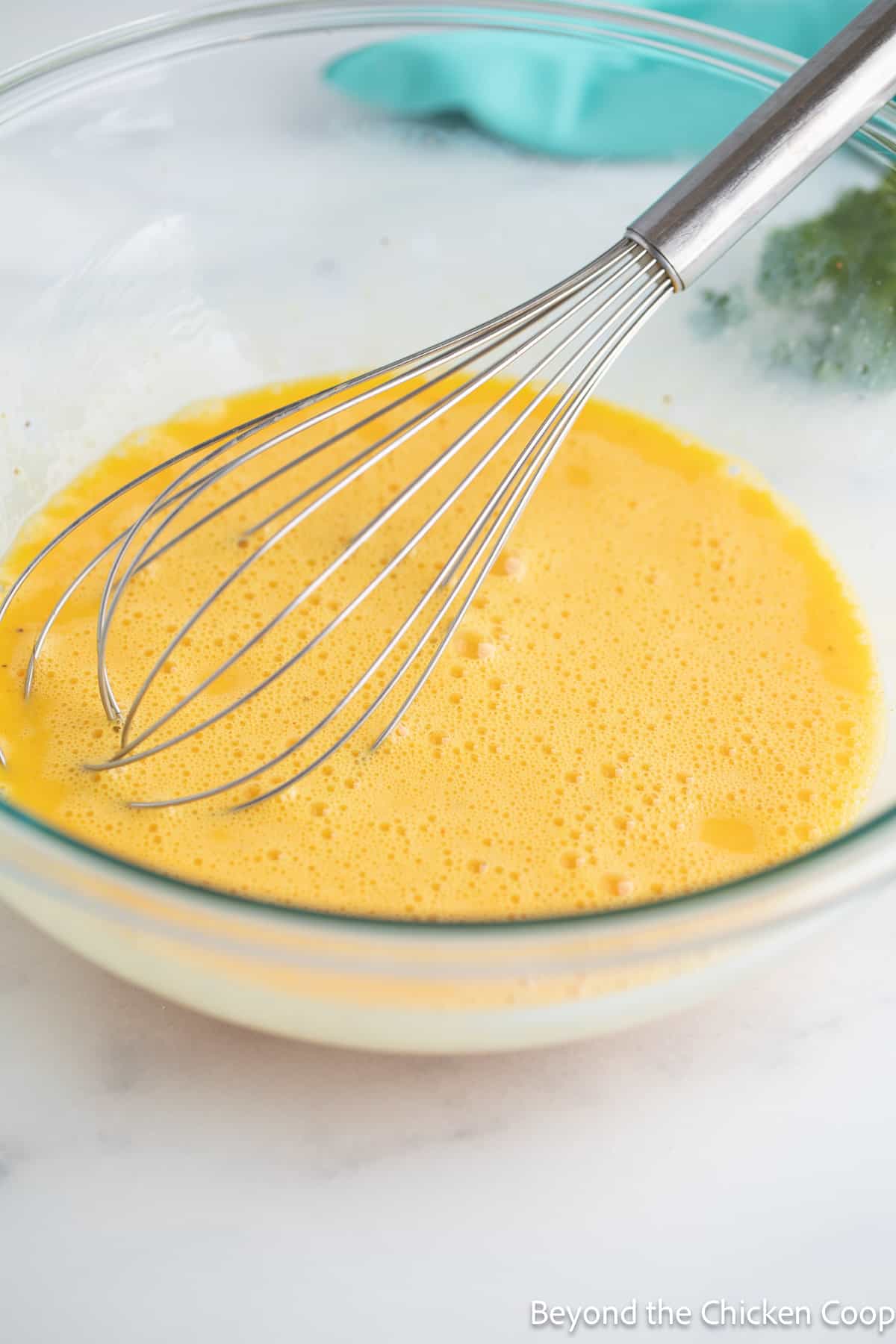 Whisked eggs in a bowl. 