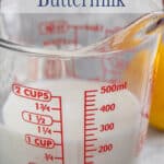 Milk in a glass measuring cup.