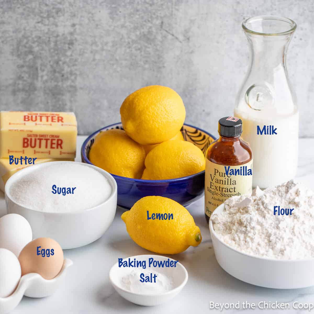 Several ingredients used for making cupcakes with fresh lemon. 