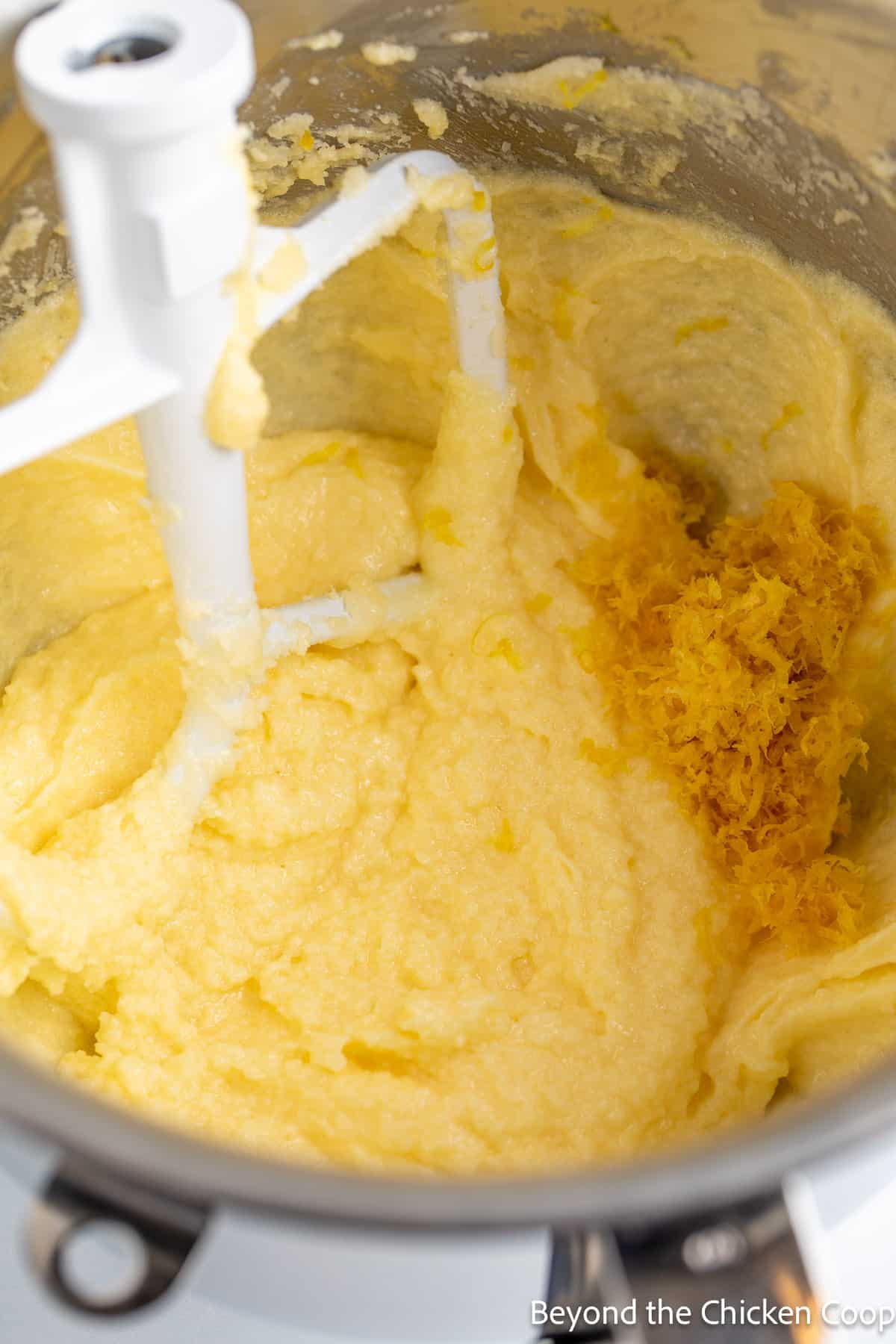 Adding lemon zest to a batter. 