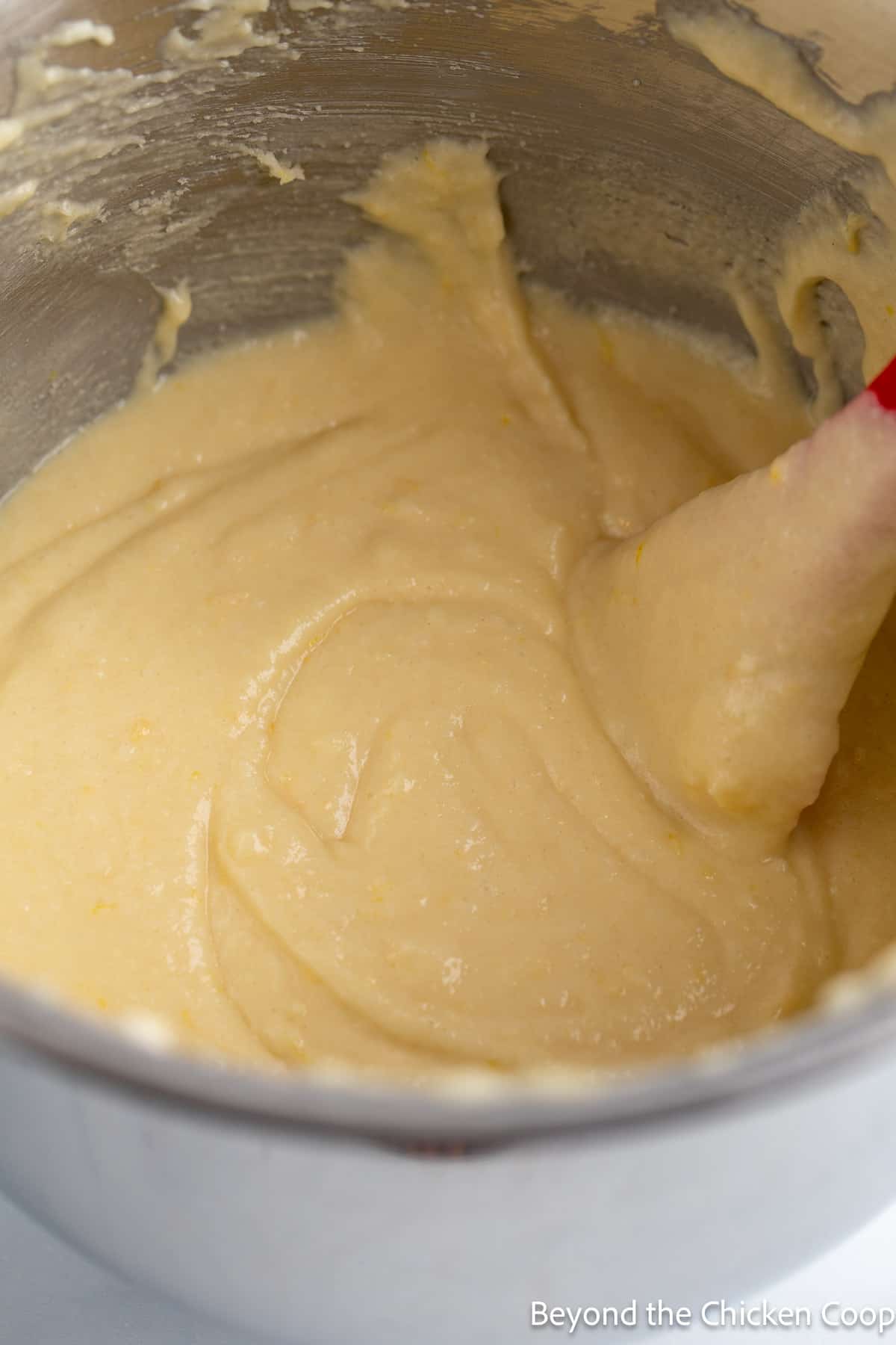 Cake batter in a mixing bowl. 