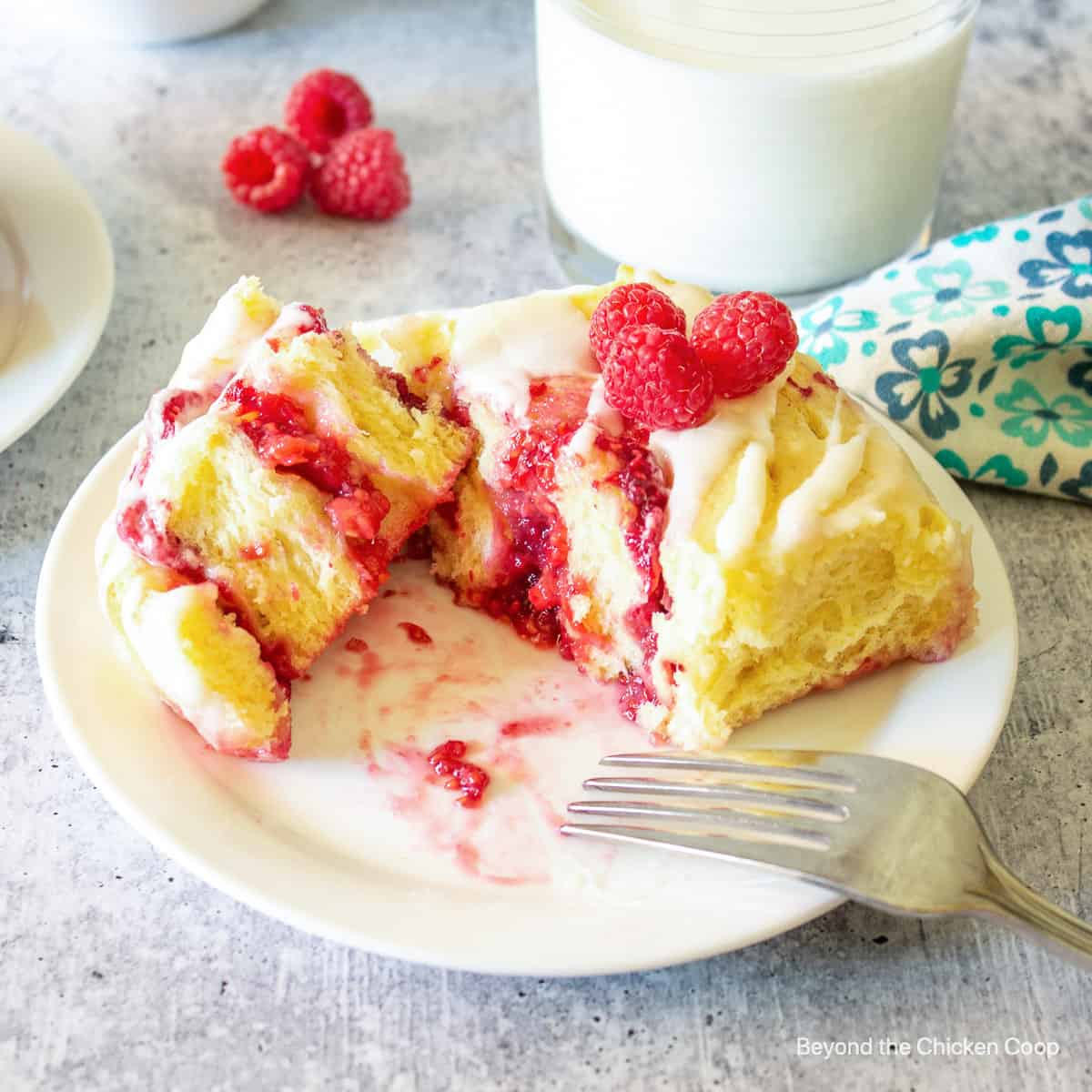 Sweet roll filled with raspberries. 