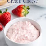 Strawberry cream cheese in a small white bowl.