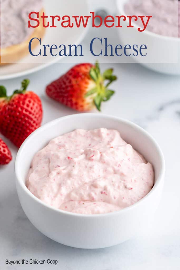 Strawberry cream cheese in a small white bowl.