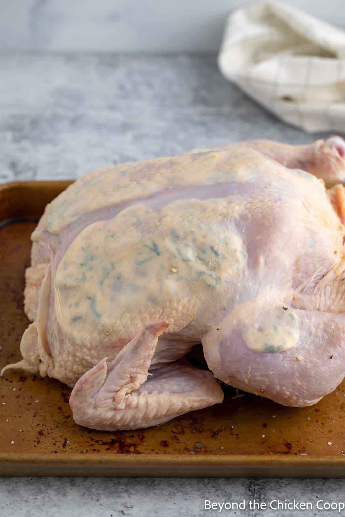 Butter and herbs under the skin of a chicken. 
