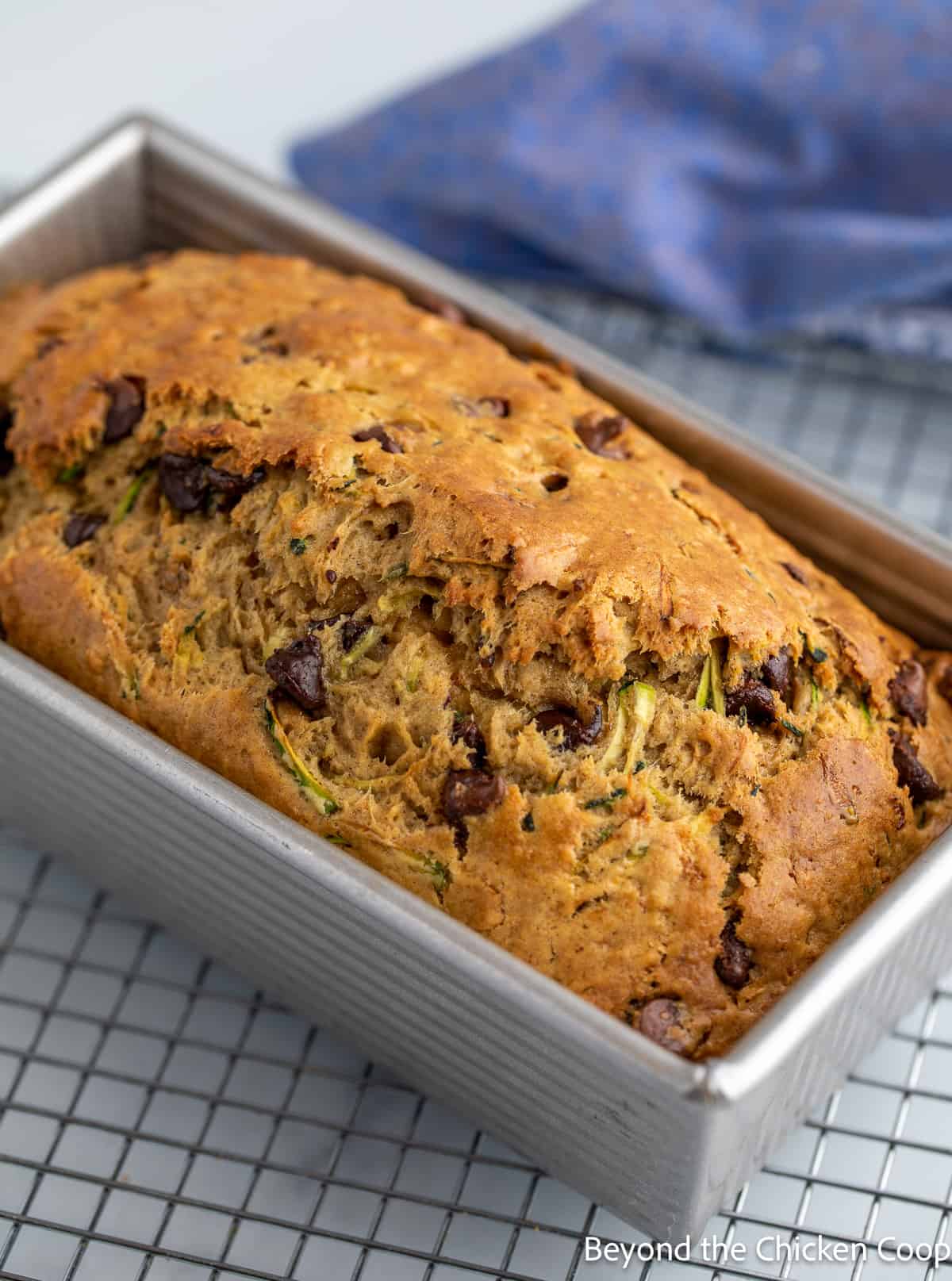 A loaf of bread in a bread pan. 