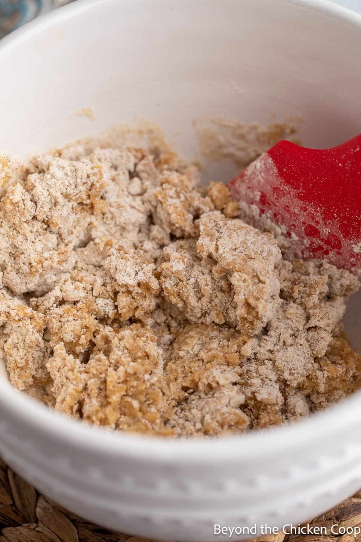 A dry batter in a white bowl. 