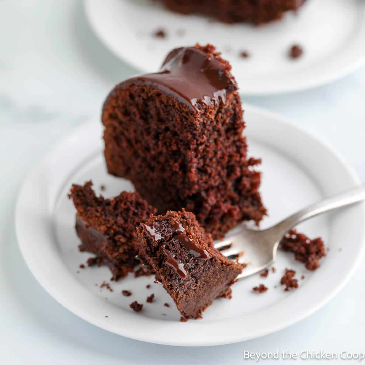 A fork with a piece of chocolate cake. 