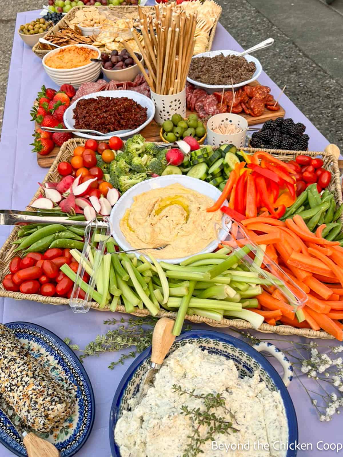 A grazing table filled with finger foods. 