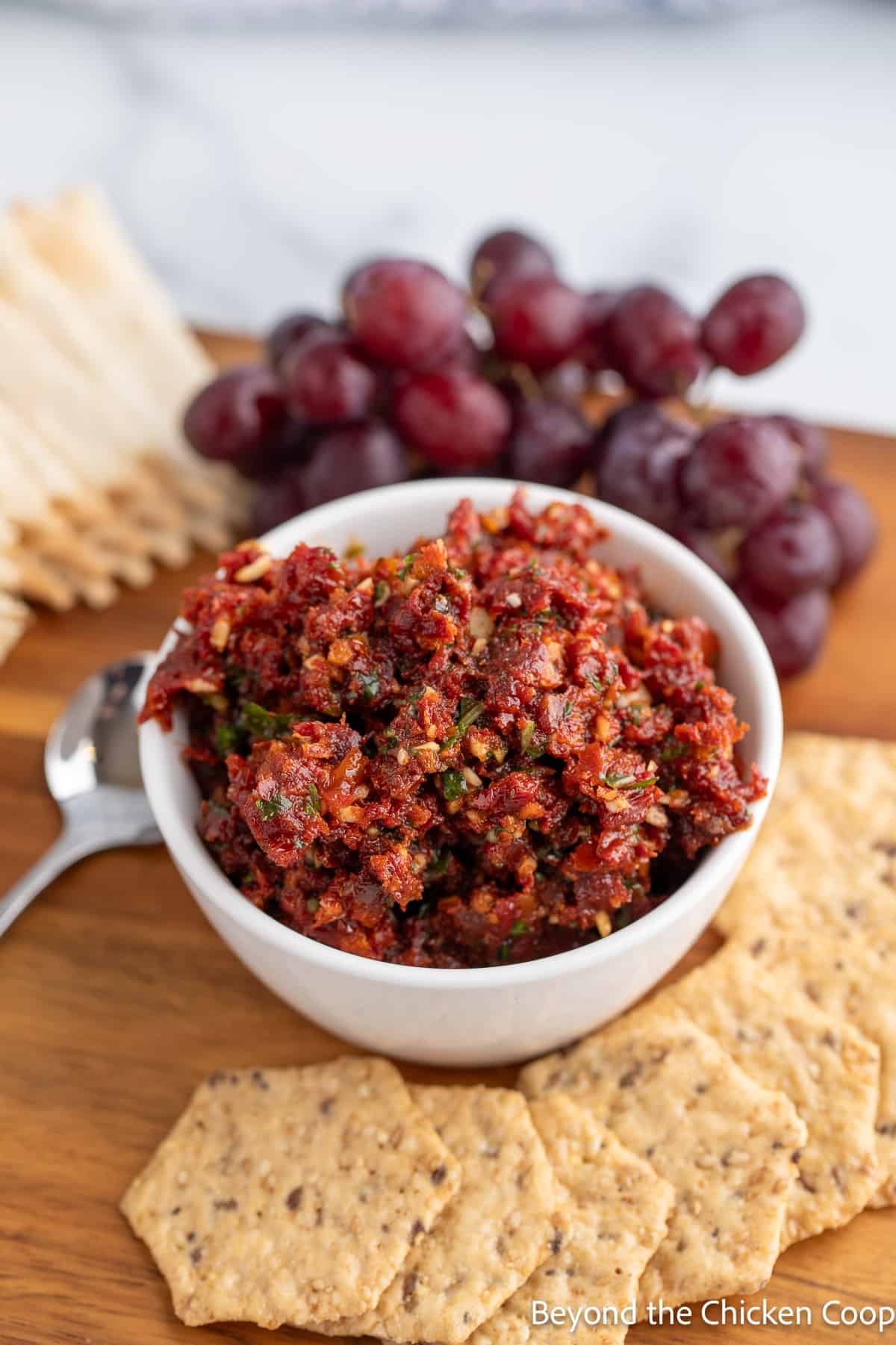 Chopped sun dried tomatoes in a bowl.
