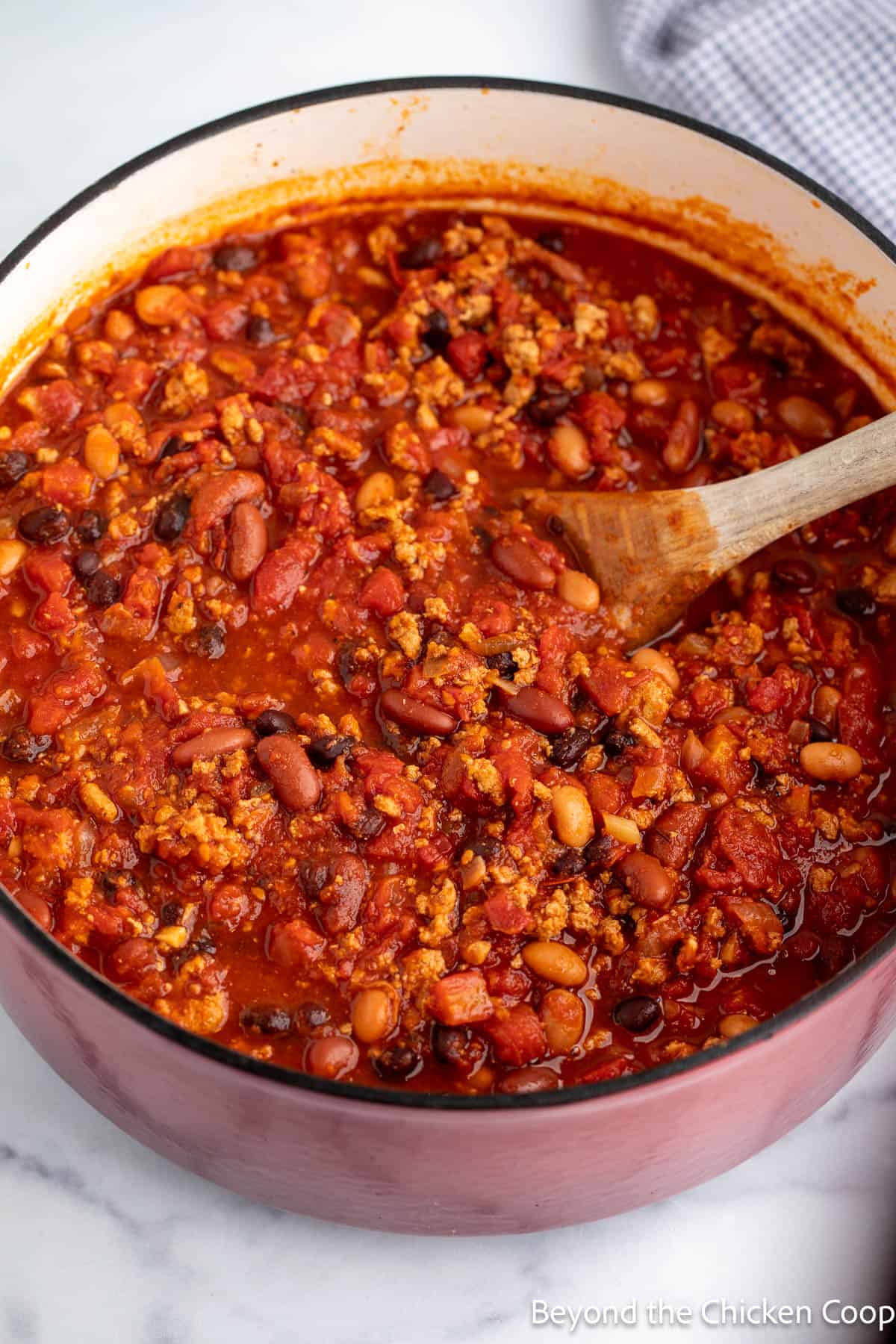 A pot of cooked three bean turkey chili. 