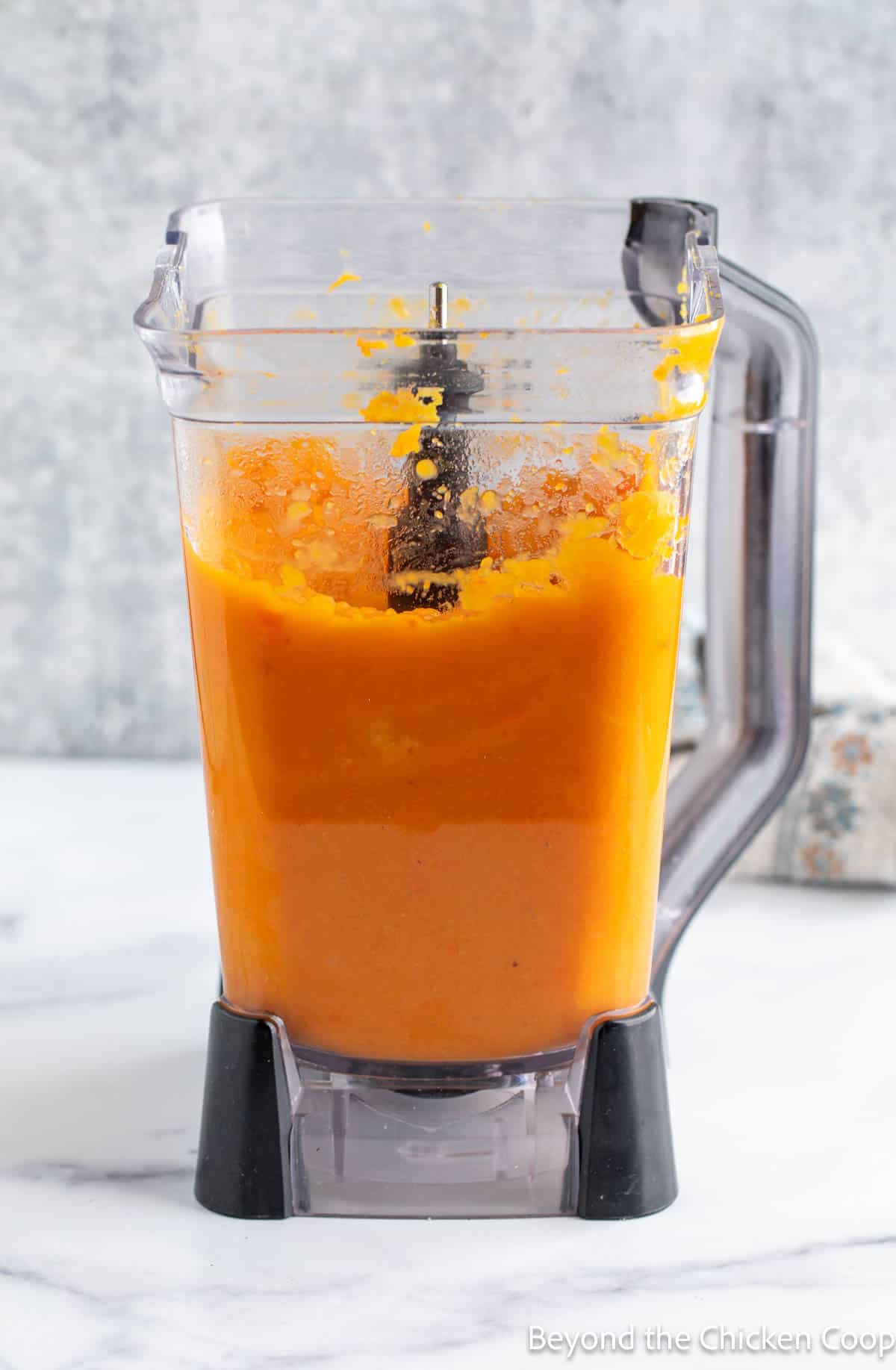 Pureed squash in a blender.