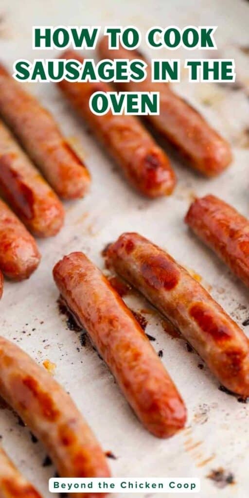 Baked breakfast sausage links on a baking sheet.