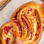 Cranberry bread filled with chopped cranberries.
