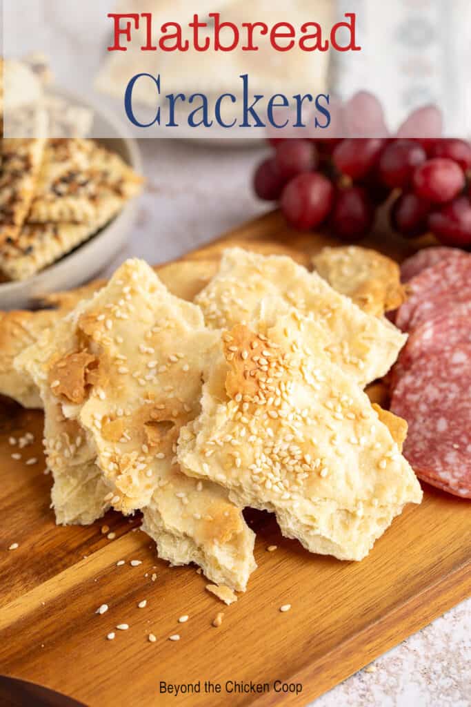 Flatbread crackers on an appetizer board.