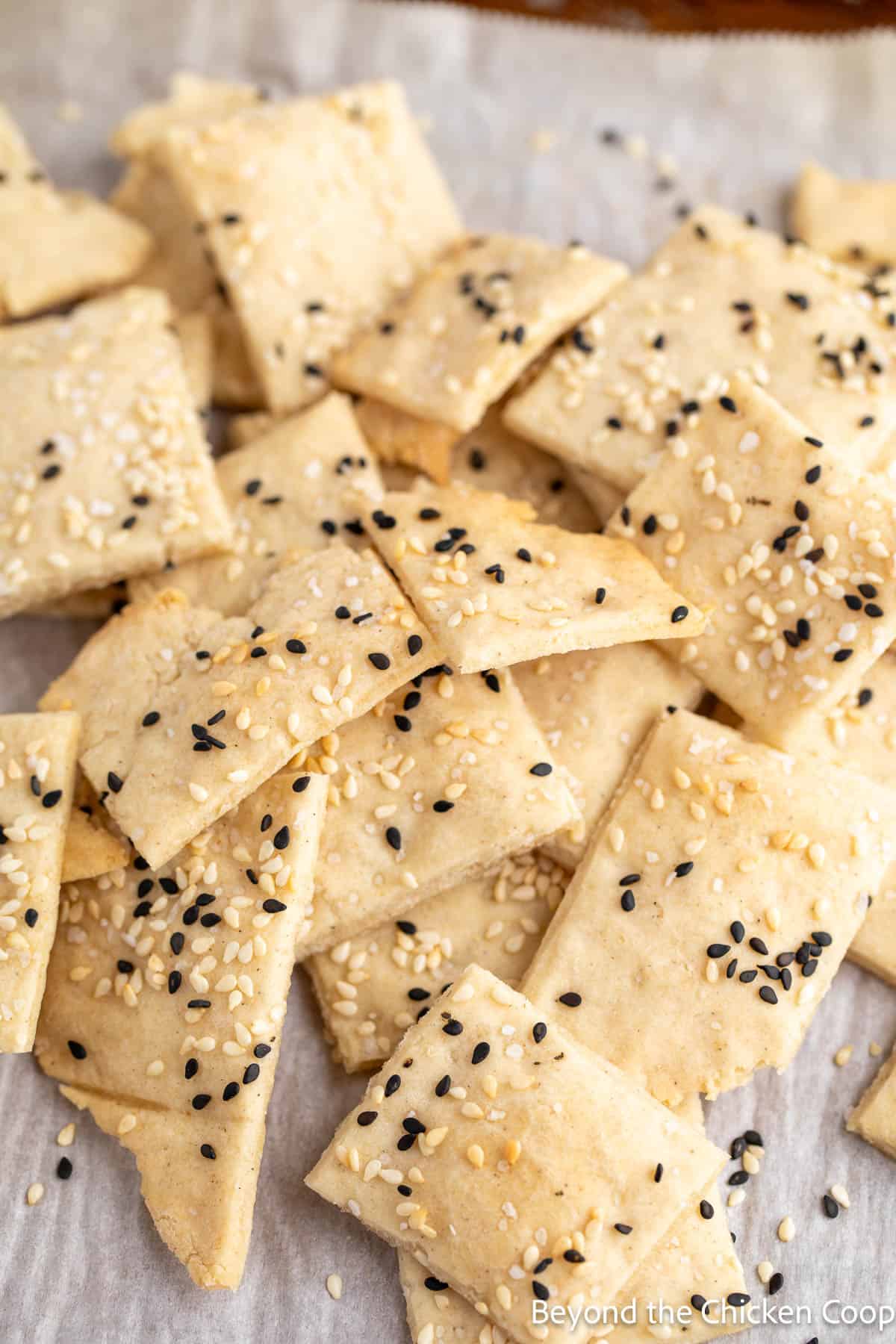 Gluten-Free flatbread crackers on a baking sheet.