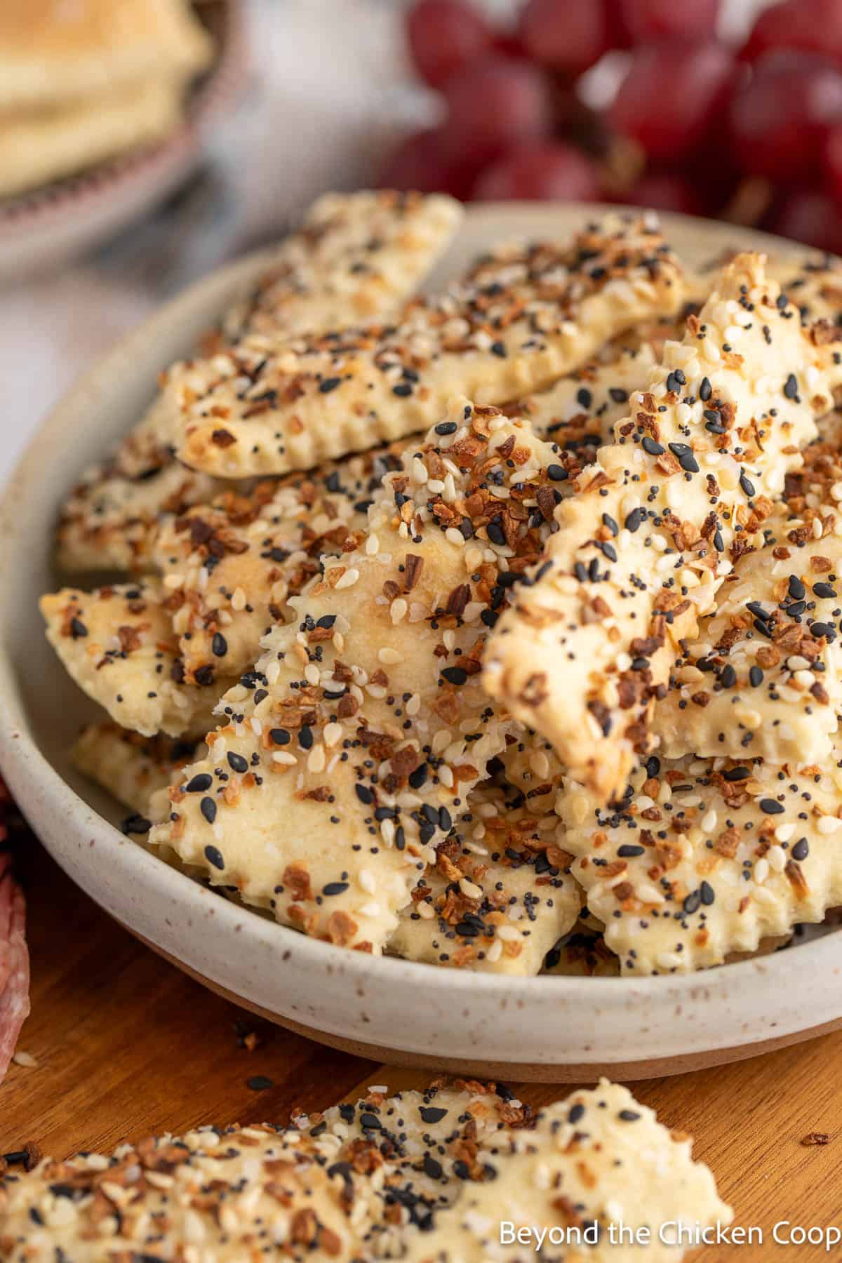 Everything bagel crackers in a bowl. 