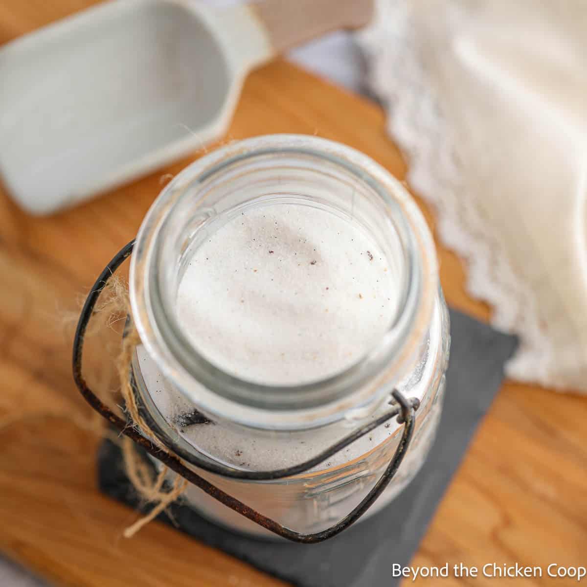 A jar filled with vanilla sugar.