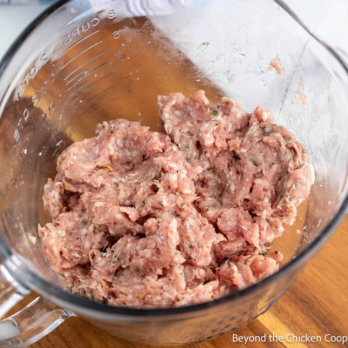 Mixed pork sausage in a bowl.