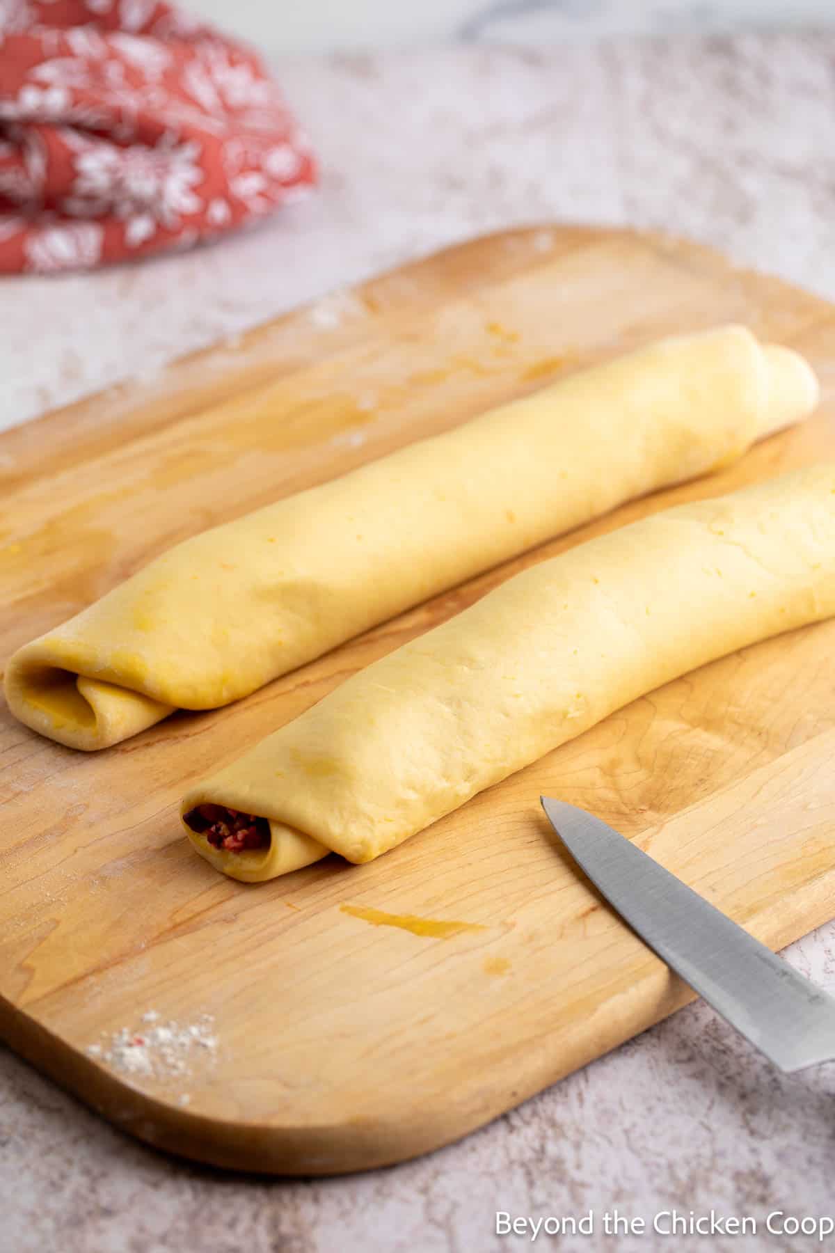 Dough rolled into two logs. 